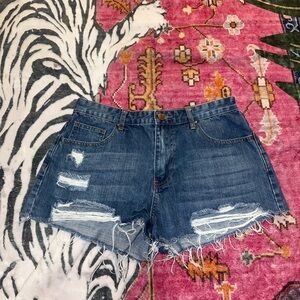 Distressed denim shorts